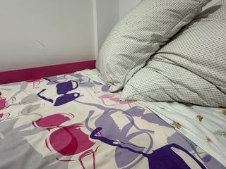 Cama nido con cajones rosa y blanco