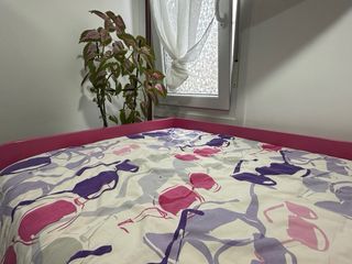 Cama nido con cajones rosa y blanco