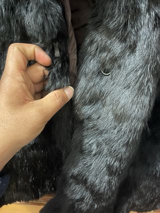 Cappotto in pelliccia nero