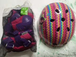 Patines Oxelo Play 5 Talla 32-34 con casco y prot.