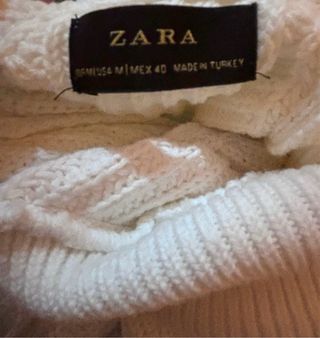 Jersey blanco cuello vuelto