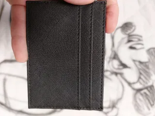 Portafoglio nero con iniziali dorate A.M.