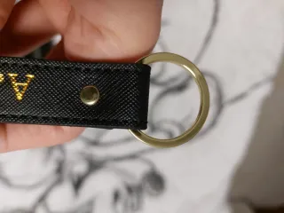 Portafoglio nero con iniziali dorate A.M.