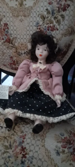 Muñeca de porcelana y trapo antigua