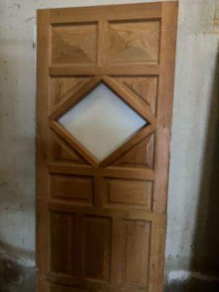 Puertas antiguas de madera con cristales