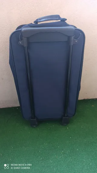 Maleta de viaje azul pequeña