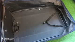 Maleta de viaje azul pequeña