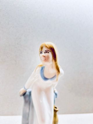 Figura de porcelana 22cm sellada y numerada