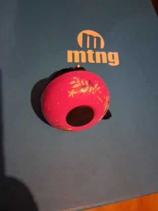 Timbre de bicicleta rosa con diseño