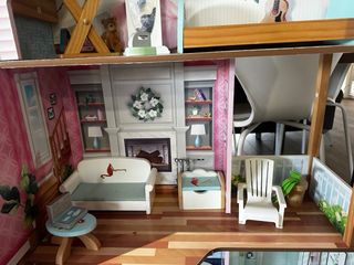 Casa de muñecas de madera