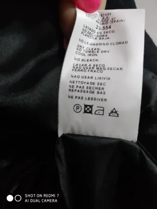 Americana de paño negra