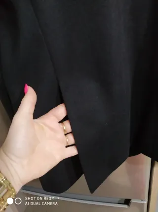 Americana de paño negra