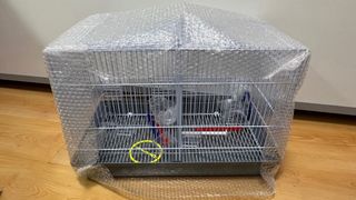 Jaula doble para pájaros nueva