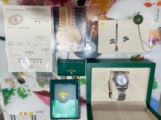 Caja de tipo reloj Rolex Reloj a parte.