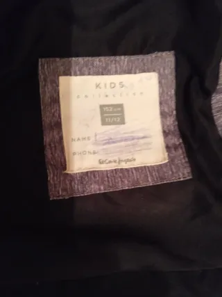 Abrigo chico gris y negro