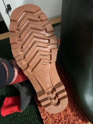 Stivali in gomma verdi mai usati