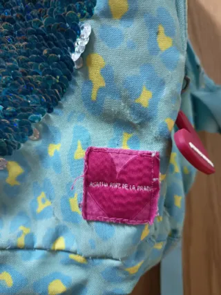 Mochila azul con corazón lentejuelas