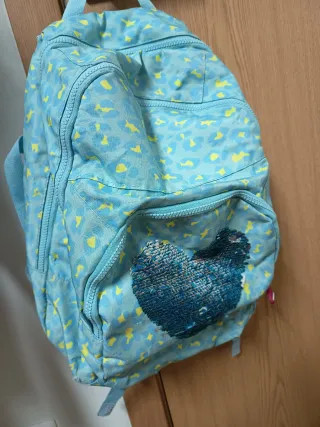 Mochila azul con corazón lentejuelas