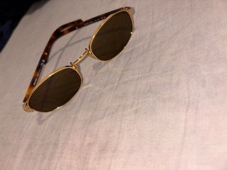 Gafas de sol Prada doradas y marrones