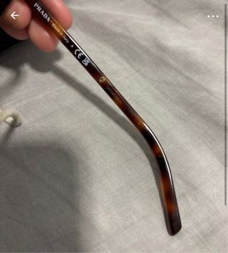 Gafas de sol Prada doradas y marrones