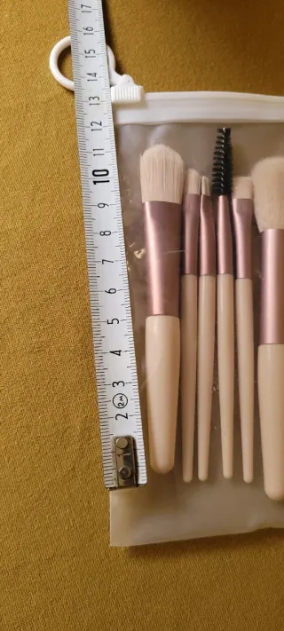 Set brochas maquillaje beige y dorado