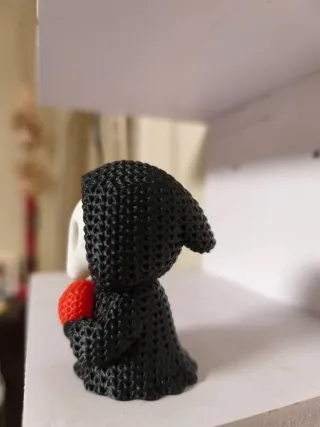 Figura decorativa calavera con corazón