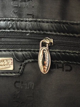 Bolso negro marca Pourchet