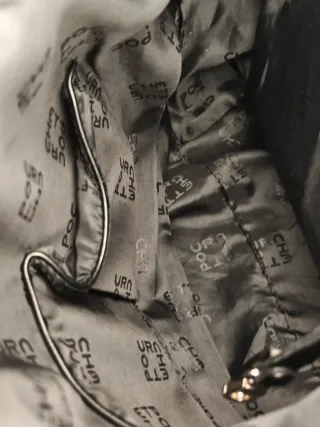 Bolso negro marca Pourchet