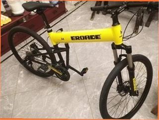 Bicicleta plegable amarilla