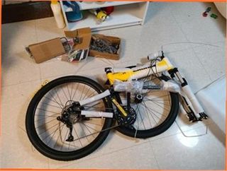 Bicicleta plegable amarilla