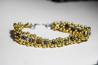 Pulsera de cristal austriaco dorada