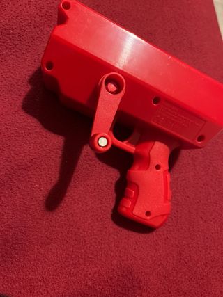 Expendedor de billetes rojo