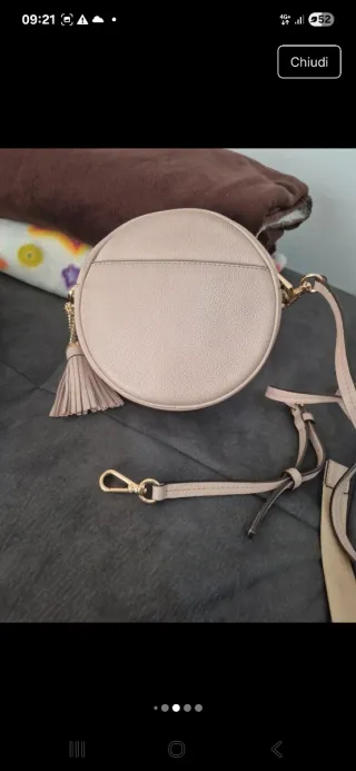 Borsa Michael Kors tonda rosa con nappina