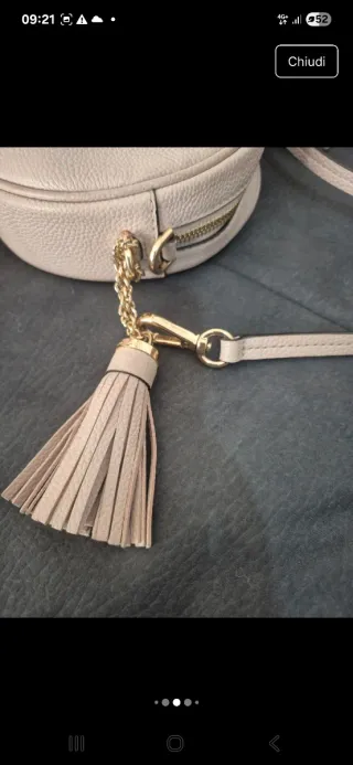 Borsa Michael Kors tonda rosa con nappina