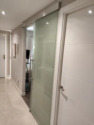 Puerta corredera de cristal