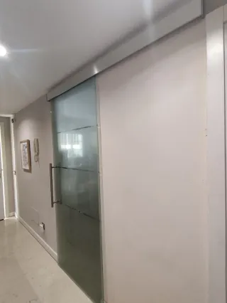 Puerta corredera de cristal