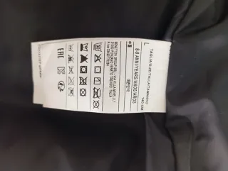 Chaleco acolchado verde con capucha