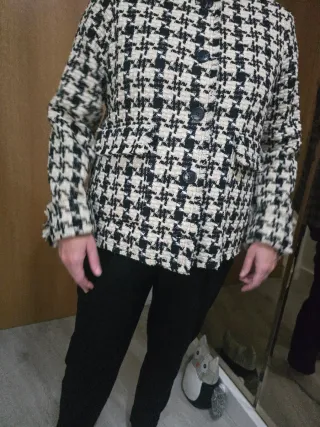 Chaqueta tweed beige y negra