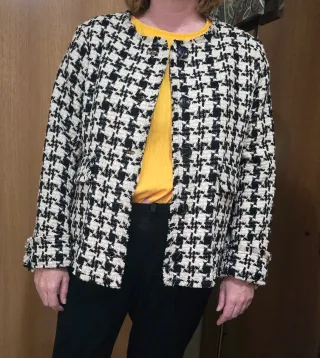 Chaqueta tweed beige y negra