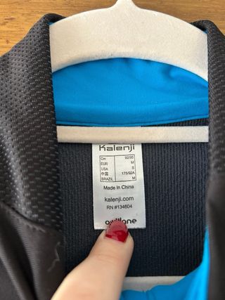 Chaqueta deportiva Kalenji hombre negra y azul