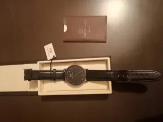 Reloj Daniel Wellington Negro y Dorado