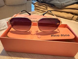 Gafas de sol Miu miu doradas