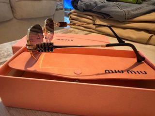 Gafas de sol Miu miu doradas