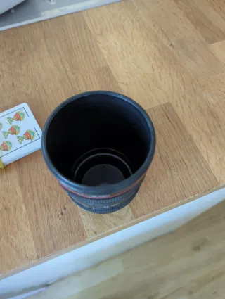 Vaso portalápices objetivo cámara