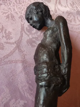 Escultura de bronce