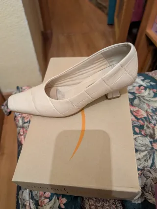 Botas negras con cremallera y tejido