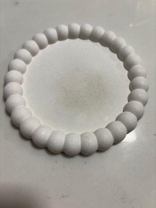 Vassoio rotondo in cemento bianco