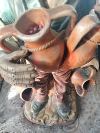 Figura artesanal hombre con cántaros