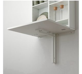 Mesa abatible pared con almacenaje. Blanco.
