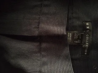 Pantalón elegante Mango Collection sin uso.